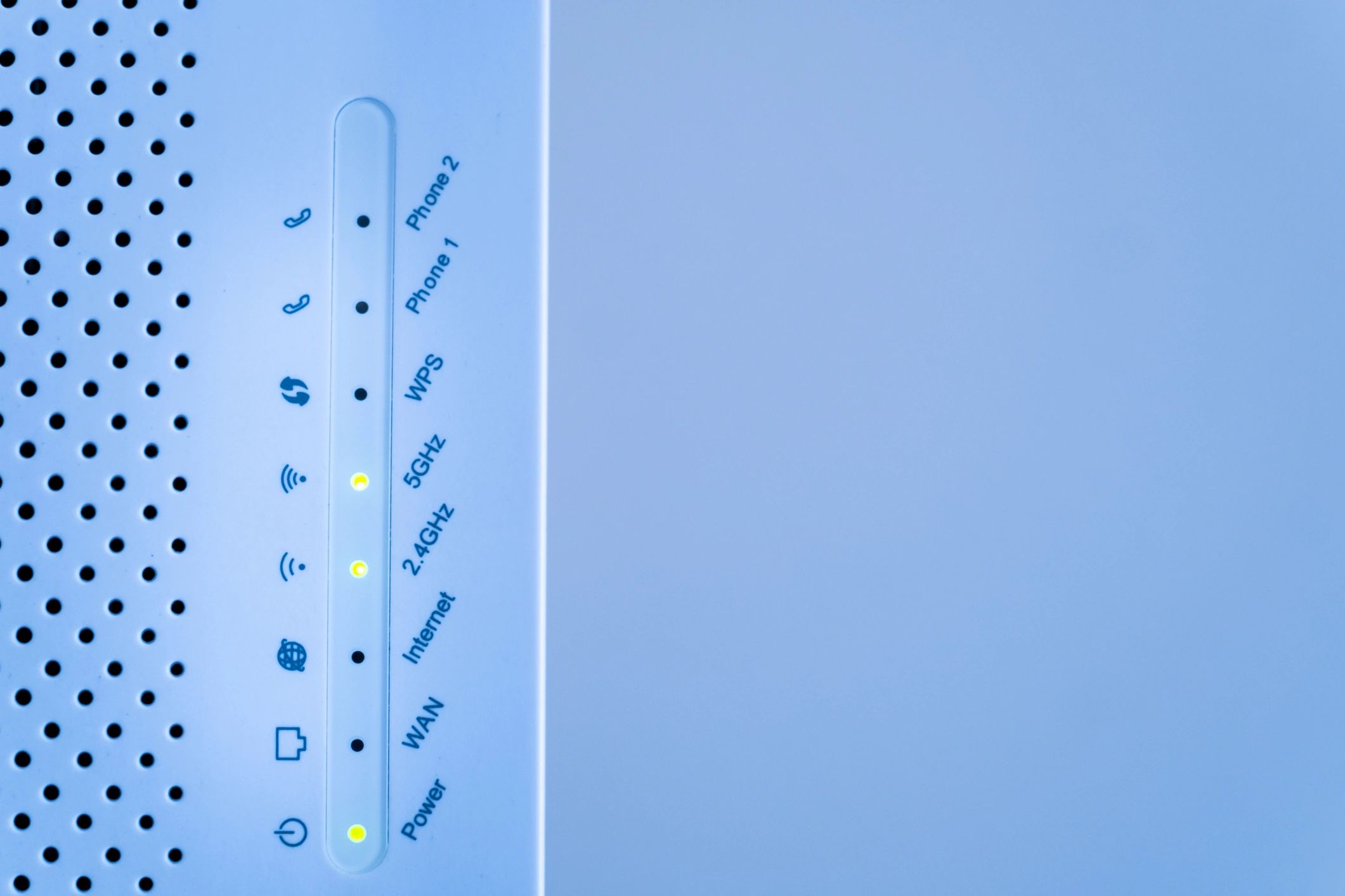 Close-up of a WiFi router with indicator lights