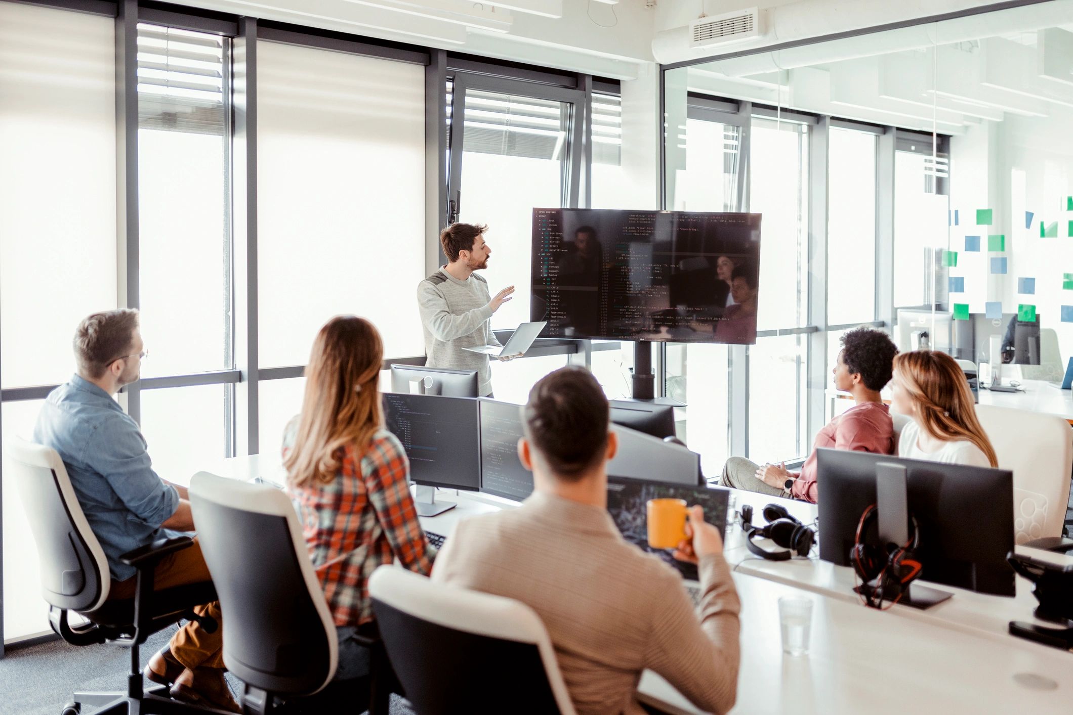 IT team collaborating in a meeting