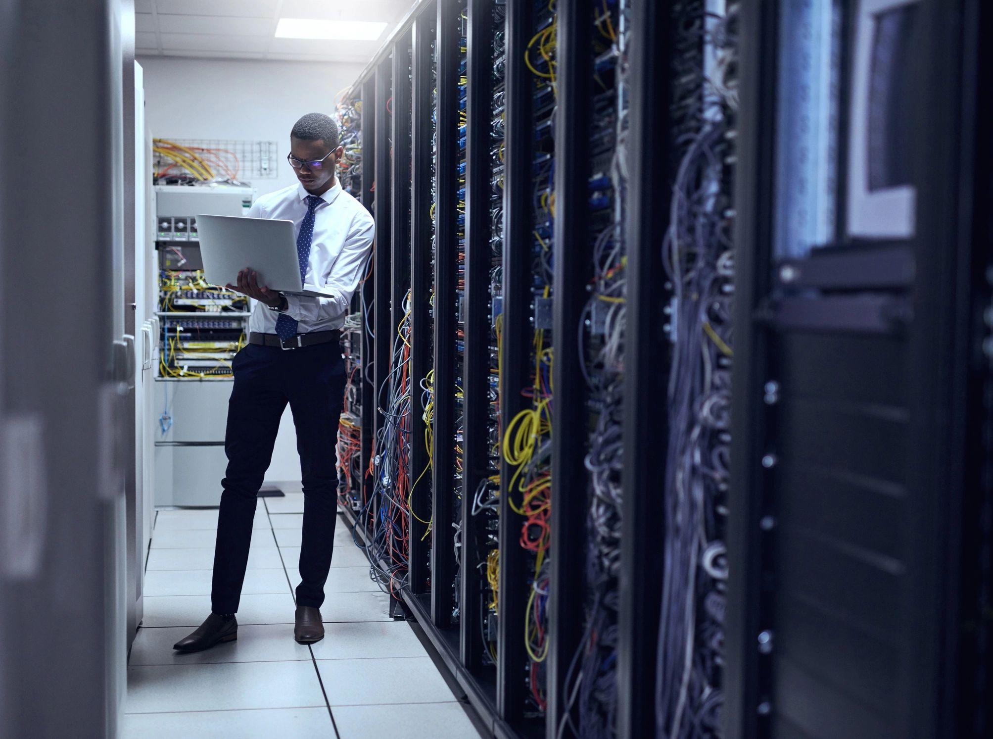 IT technician working in a server room